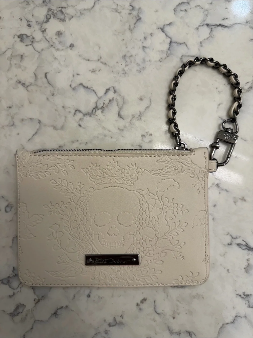 Betsey Johnson Ivory Skull Embossed Zip Wristlet 7” x 5”